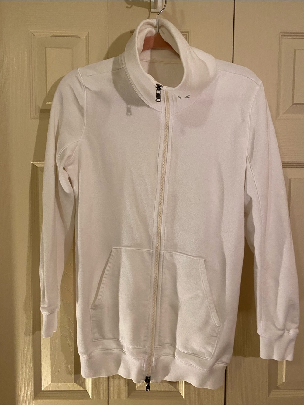 Under Armour woman’s white zip up jacket